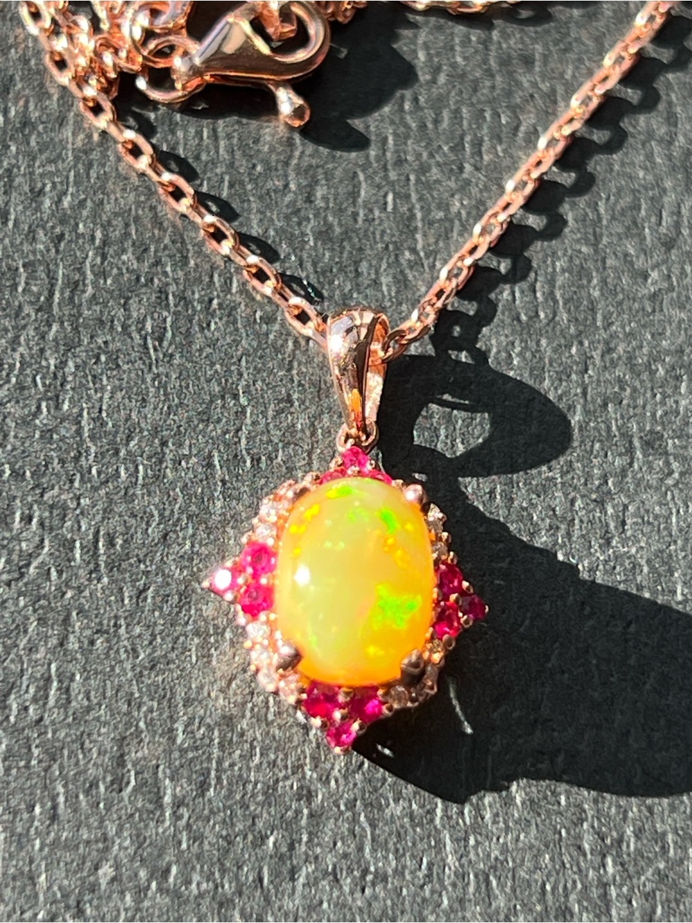 Rose Gold Opal Pendant Necklace with Rubies and Diamond’s in 10k